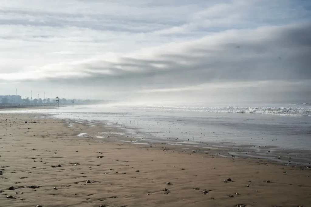 Misty morning on Agadir beach in front of the seafront hotels