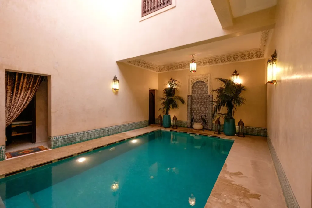 Elegant indoor pool with traditional Moroccan decor