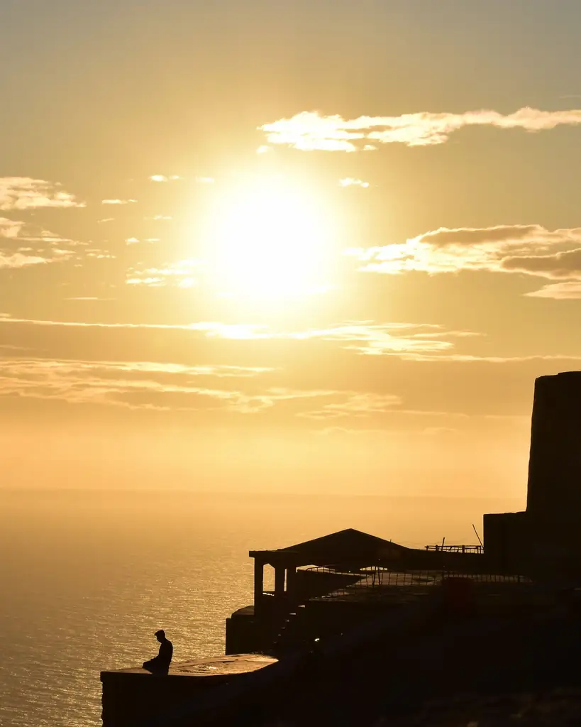 Sunset over the Agadir coastline seen from the cliffs