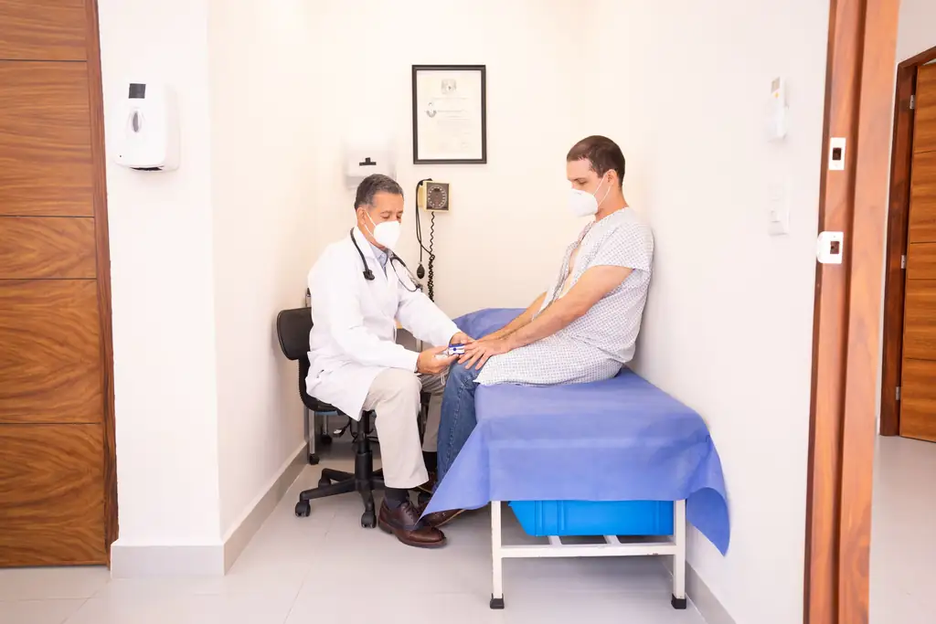Doctor examining a patient during a consultation