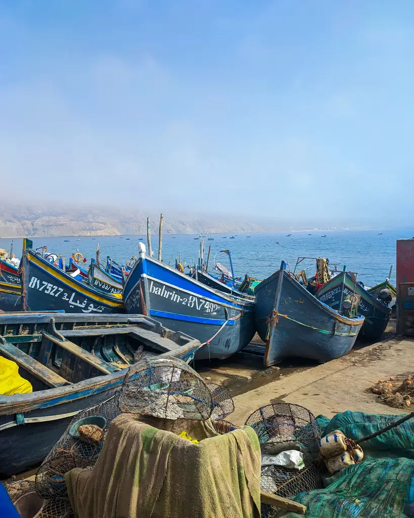Blue wooden fishing boats moored in a Moroccan harbour